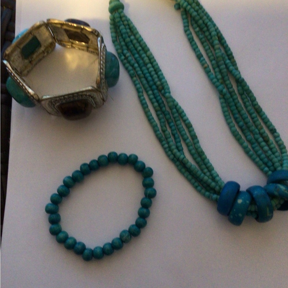 3 piece One metal  bracelet,brown,blue colors,One necklace. One beaded bracelet